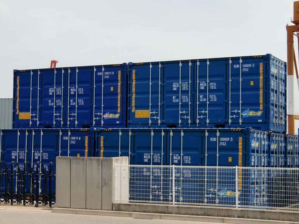 high cube shipping container dimensions on stacked blue containers