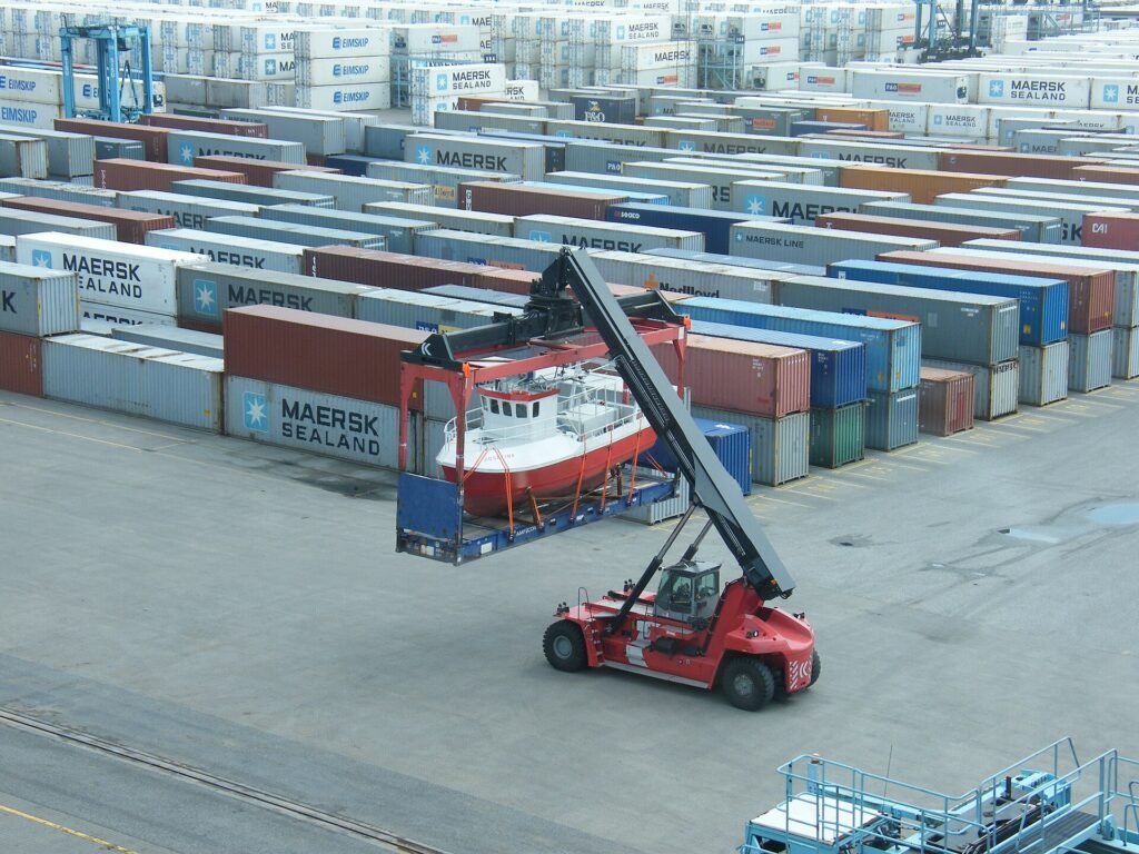 flat rack container carrying a small boat