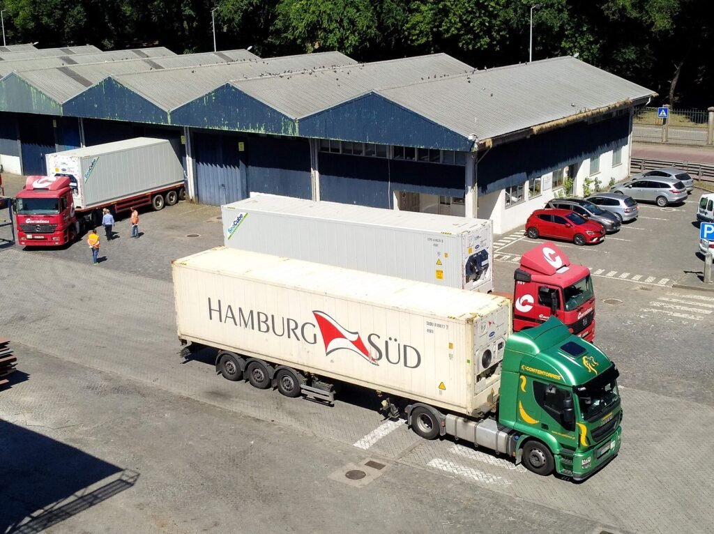 reefer containers on trucks at a depot