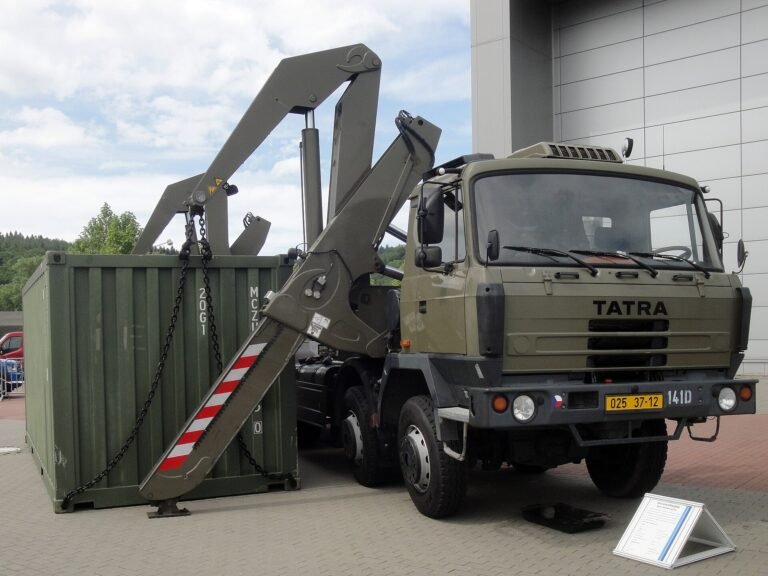 side-lifter truck placing a 20ft container during shipping container delivery